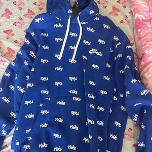 Blue Nike Hoodie with lots of Nike signs on it!